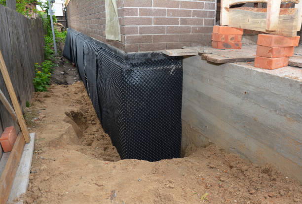 Happy homeowners after waterproofing job in Rosalia
